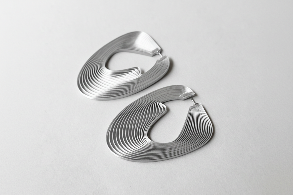 Silver eco-friendly optical art large hoop earrings