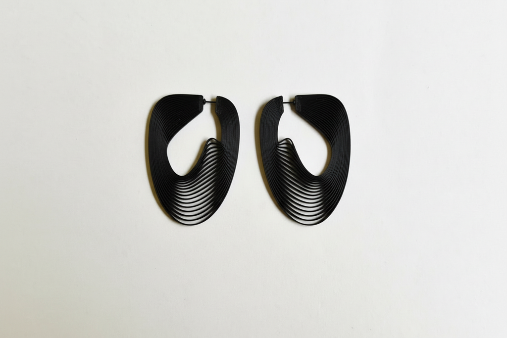 Black art optique eco-friendly earrings