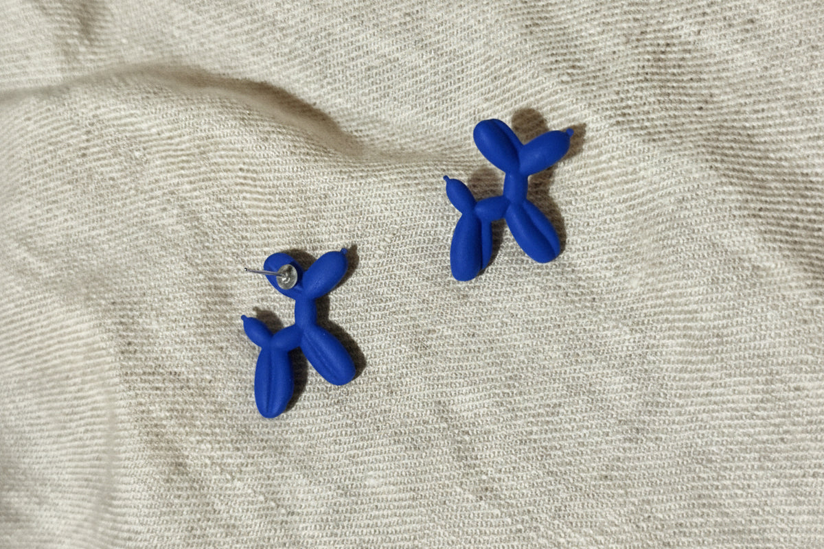 Earrings by miette on blue color called The dog inspired by Jeff Koons Silver studs in bioplastics